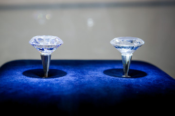 two large diamonds on a blue background