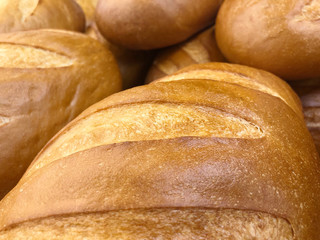 Food, freshly baked bread, on a shelf in the store.