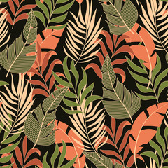 Summer seamless tropical pattern with bright red and green plants and leaves on a black background. Jungle leaf seamless vector floral pattern background.  Tropic leaves in bright colors.