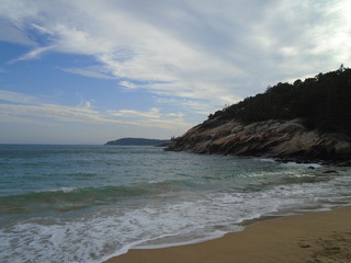 Rocky Maine Coast with the Atlantic Ocean reflecting off the water as it washes ashore