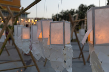 Paper lanterns hanging together with candles inside in Loi Krathong Festival, Chiang Mai, Thailand