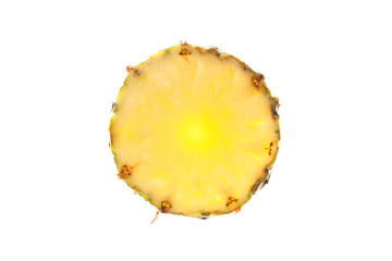 Backlit pineapple slice isolated on white background