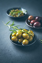 Whole green and black olives and capers . Flat lay. Copy space. Mediterranean cuisine