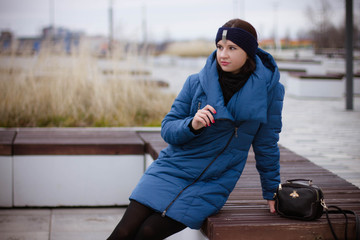 young woman sitting on stairs