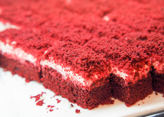Mini size of red velvet cake Arranged on a white plate. Close up of red velvet chocolate cake for...