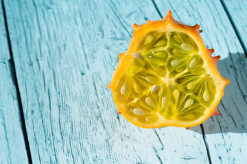 fruit kiwano in blue wooden background