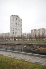 Naklejka premium Embankment and pedestrian zone on the city river