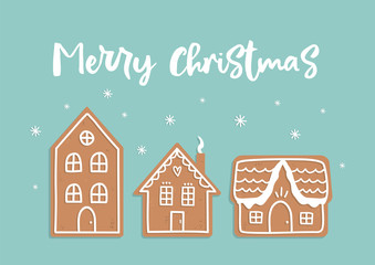 Vector doodle Christmas card with gingerbread houses on blue background