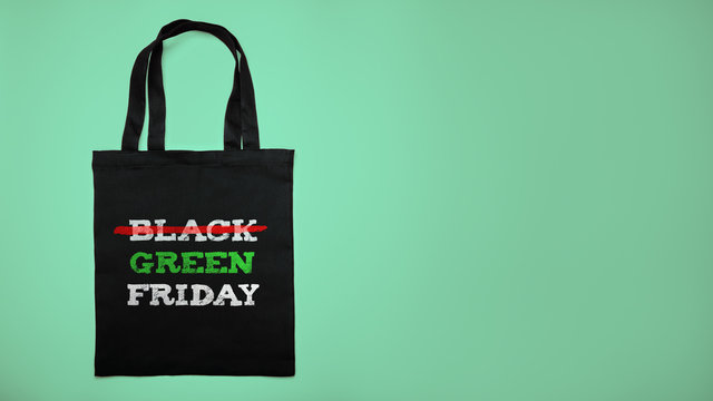 Green black friday. Cotton shopping bag with text on green background.
