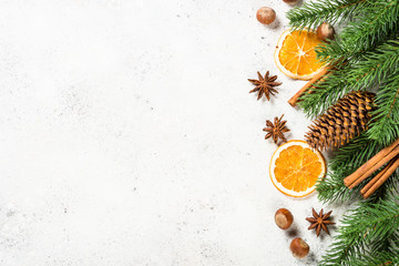 Christmas baking background with spices on white.