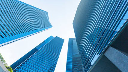 Obraz na płótnie Canvas perspective exterior pattern blue glass wall modern buildings