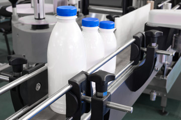 Bottle. Industrial production of plastic pet bottles. Factory line for manufacturing polyethylene...