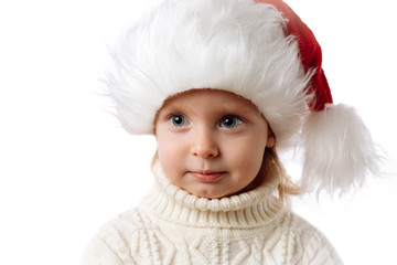 Cute Caucasian Kid In Santa Hat Closeup Portrait