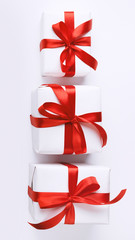 Close up of creative tower composition of Christmas gift boxes