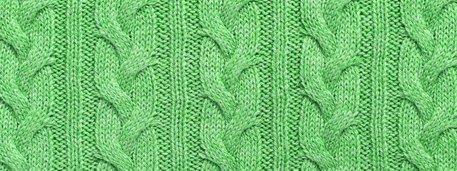 Green texture knitted woolen sweater,border. Abstract knitted fabric background.