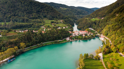 Most Na Soci Town at Emerald Lake Edge. Aerial View of Slovenia Countryside