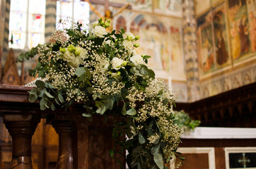 Fototapeta na wymiar Wedding bouquet on italian church