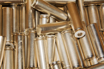 Naklejka premium A bunch of used batteries piled up disorderly for disposal. View close up. Selective soft focus.