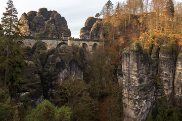 Fototapeta na wymiar Panorama of Bastei rock formations, the bridge Bastei, Saxon Switzerland National park, Germany