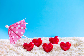 red Heart shape on white sand beach ,Image For Love Valentine Day or summer vacation Concept.