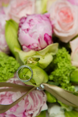 wedding ring and beautiful flowers.