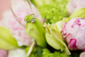 wedding ring and beautiful flowers.