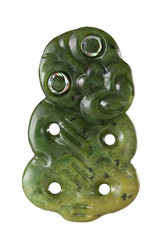 Greenstone Jade Tiki from New Zealand with Paua Eyes in traditional handicraft