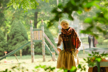 Young woman in the autumn park.