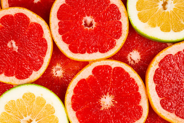 Pomelo and grapefruit slices background.