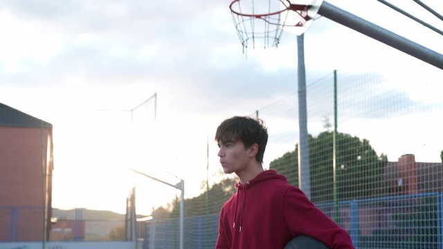 Young man playing basketball