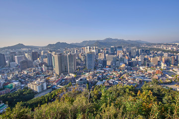 Obraz premium Scenic view of the capital of Republic of Korea. Beautiful summer look of the largest city of South Korea. Picture of town of traditional asian architecture