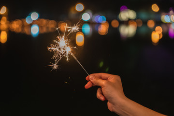 The spark stick is called cold fire. That the woman was holding to spark during the festival of happiness and brightness