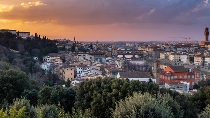 Fototapeta na wymiar Purple sunset over the ancient city of Florence