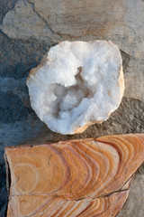 Sandstone and Crystal Geode. Natural object still life photography. Quartz geodes are beautiful for meditation and are believed to radiate high frequency energy in all directions.