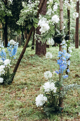 Floral teepee archway for a beautiful outdoor wedding. A modern wedding arch for an outdoor...