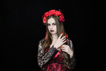 witch vampire girl in red dress with red veil - 303909930