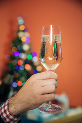 glasses of champagne on background