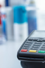 card terminal on the medications background close up