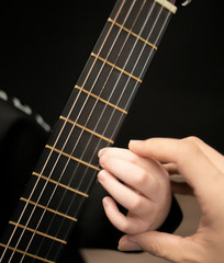 hand with guitar