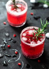 Pomegranate cocktail with rosemary