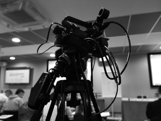 camera on tripod,video camera,media