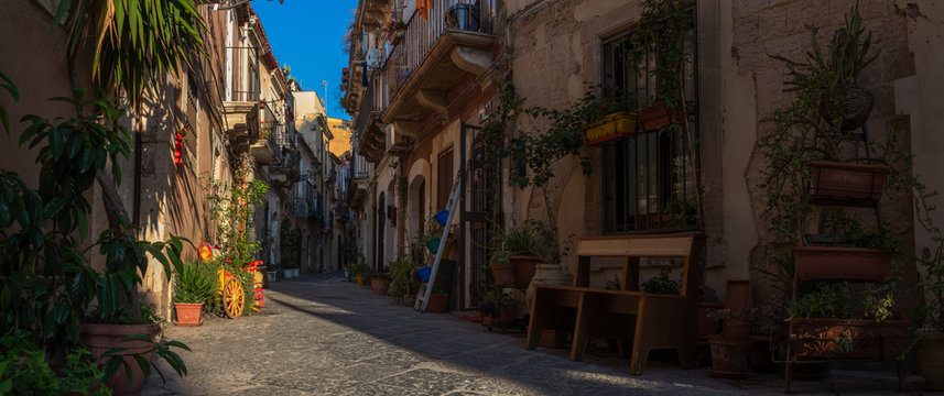 Cosy scenic street in the baroque UNESCO world heritage site Ortigia island in the province of Siracusa in Sicily, south Italy