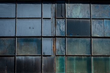 Vintage glass Windows in an abandoned old industrial building
