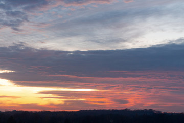 Naklejka na ściany i meble Sunset stratified clouds 