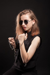 portrait of a young girl in the style of rock.