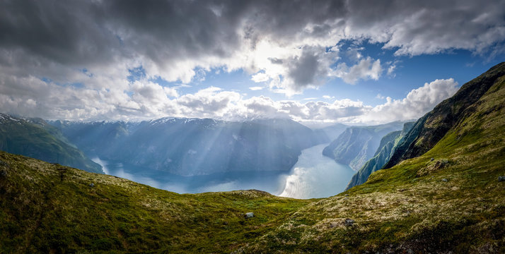 Aurlandsfjord panorama in glorious sunshine at a cloudy day Norway