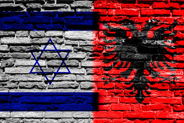 Flag of Albania and Israel on brick wall