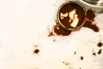 Ground Paprika in a bowl on wooden table