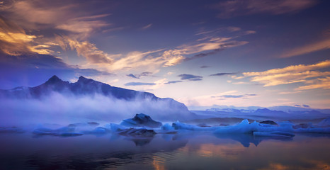 Glacier on Iceland in while sunset