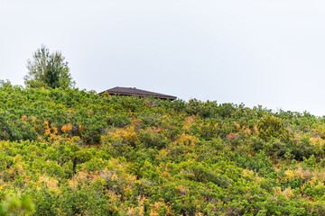 Aspen real estate in Colorado in Woody Creek neighborhood with house in 2019 autumn and cloudy sky